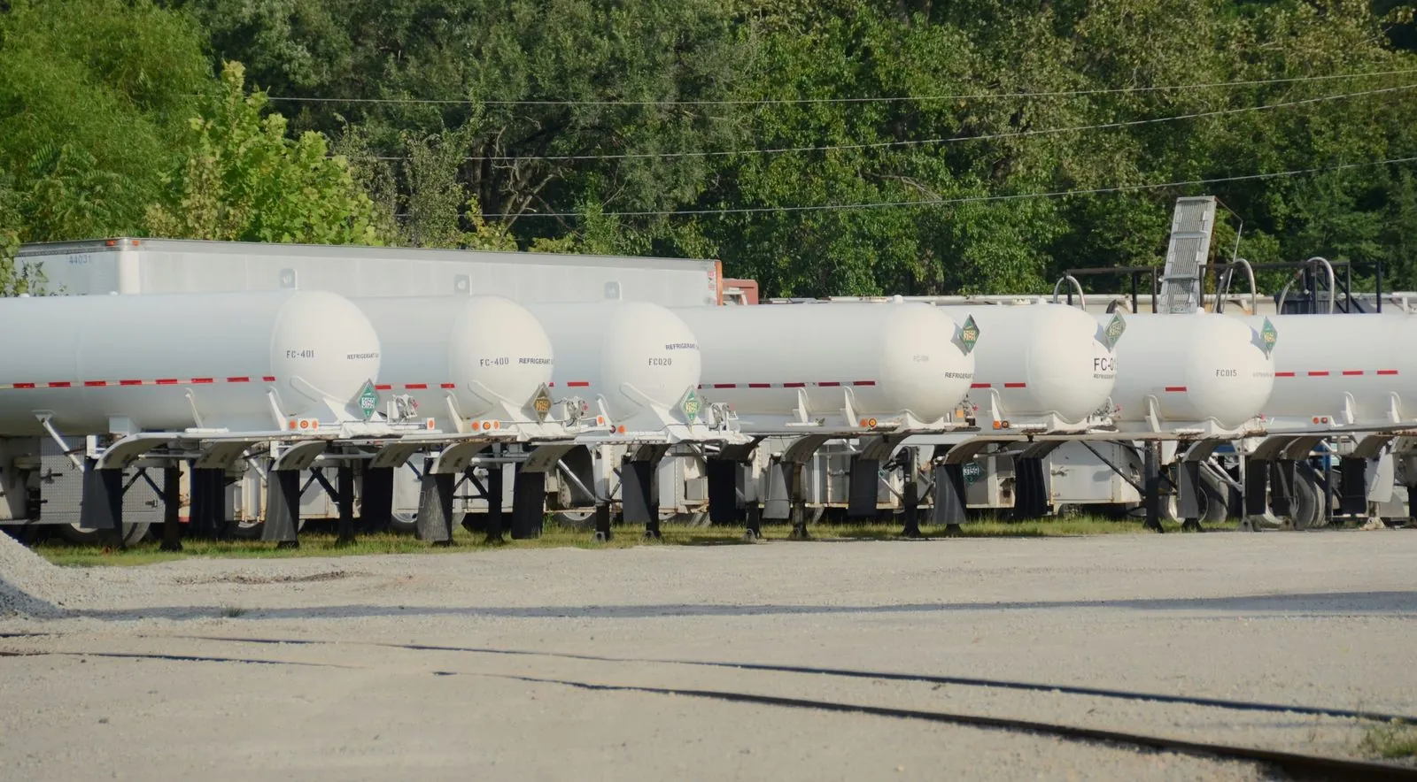A row of tanker trailers ready for delivery