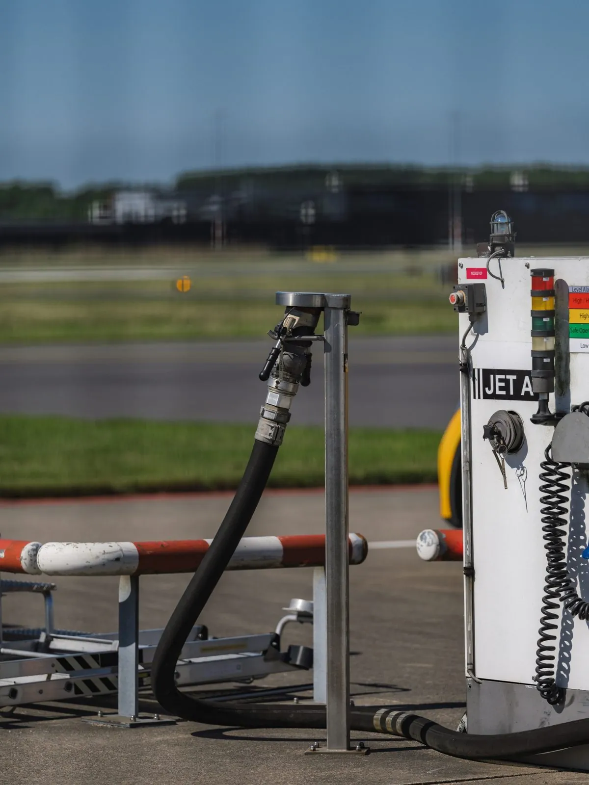 Fuel dispenser and hose at a bulk fuelling point